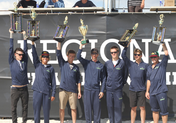 UNCW Surf Team at NSSA Easterns with trophies. Photo by Chandler Hatch.